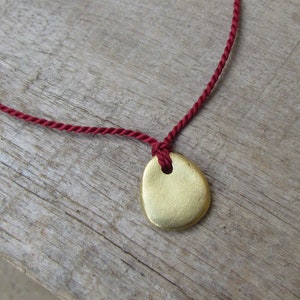 Silk Necklace And An Organic Pebble Pendant