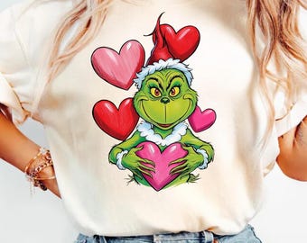 Grinch Valentine’s Day Design - Cute Grinch Holding Hearts Illustration, Romantic Holiday Art, PNG Digital Download, Perfect for Crafts