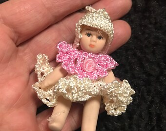 tiny porcelain dolls