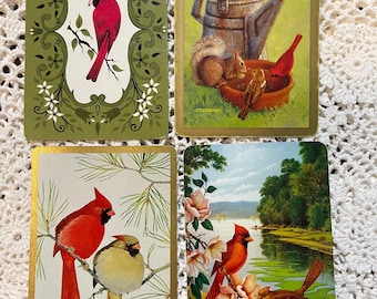 4 cardinal birds playing cards