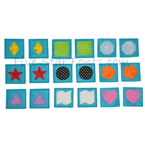 May include: A set of 18 felt squares with different shapes and colors. The shapes include stars, diamonds, circles, hearts, clouds, and triangles. The colors include red, yellow, green, blue, orange, pink, and black.