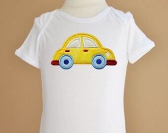 May include: A white baby onesie with a yellow embroidered car on the front. The car has red wheels and blue details.