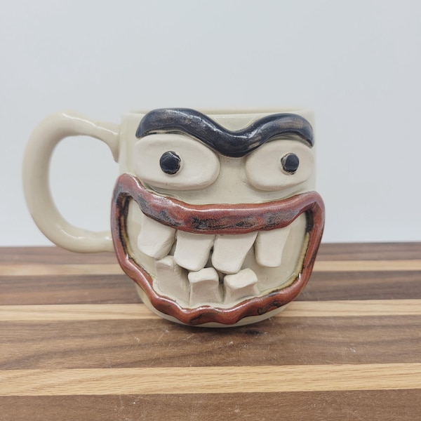 Cheesecake Lover Unibrow Face Mugs. Medium Coffee Cup 12 Ounces. Coffee Tea Cups and Mugs. Stoneware Pottery Handmade Ceramics.