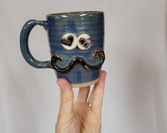 In Love Mug Special Day Gifts. Handlebar Mustache Lover. Blue Pottery Coffee Cups and Mugs. Unique Handmade UgChug Heart Eye Face Mug