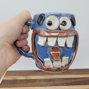 May include: A rustic wooden sign with the text "Welcome to our home" in white lettering. The sign features a distressed finish and a simple, inviting design, perfect for front door decor.