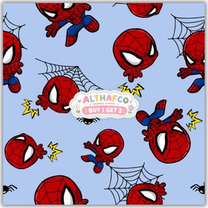 May include: A light blue seamless pattern featuring cartoon red and blue spider-themed characters, black spider webs, and yellow lightning bolts. A central white label displays the text ALTHAFCO seamless pattern BUY 1 GET 2.