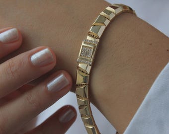 Bransoletka geometryczna ze złota 14k: gruby łańcuszek, detale trójkątne