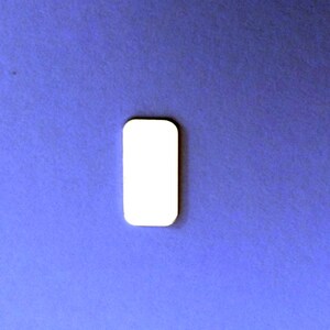 May include: A white rectangle cutout on a blue background.