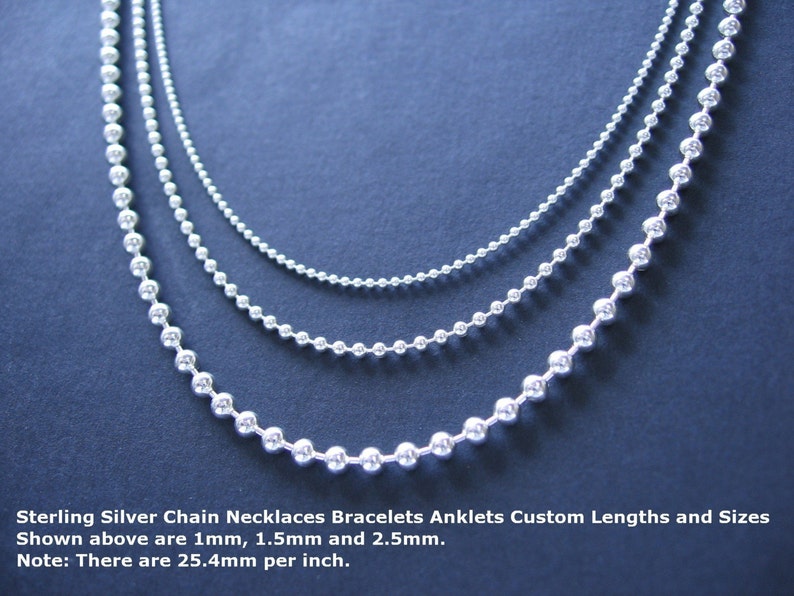 May include: Three silver chains of different sizes, 1mm, 1.5mm, and 2.5mm, shown on a dark blue background. Sterling Silver Chain Necklaces Bracelets Anklets Custom Lengths and Sizes. Shown above are 1mm, 1.5mm and 2.5mm. Note: There are 25.4mm per inch.