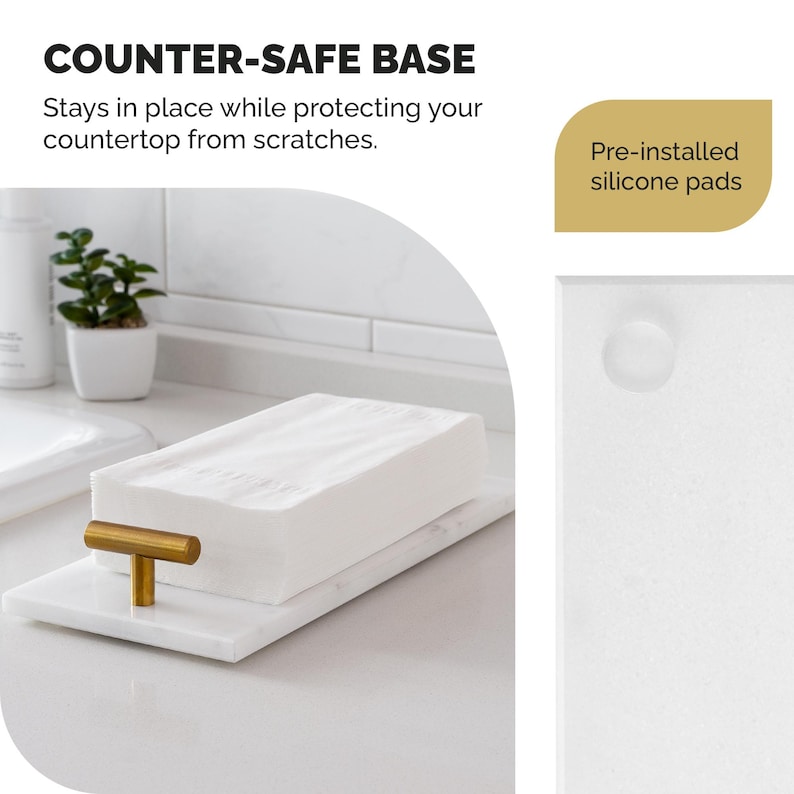May include: A white marble tray with a gold-colored handle, holding a stack of white paper. The text "COUNTER-SAFE BASE" and "Pre-installed silicone pads" are visible. The tray is designed to protect countertops from scratches.