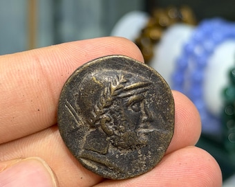 Moneda de bronce inmaculada de un rey griego antiguo de Asia central