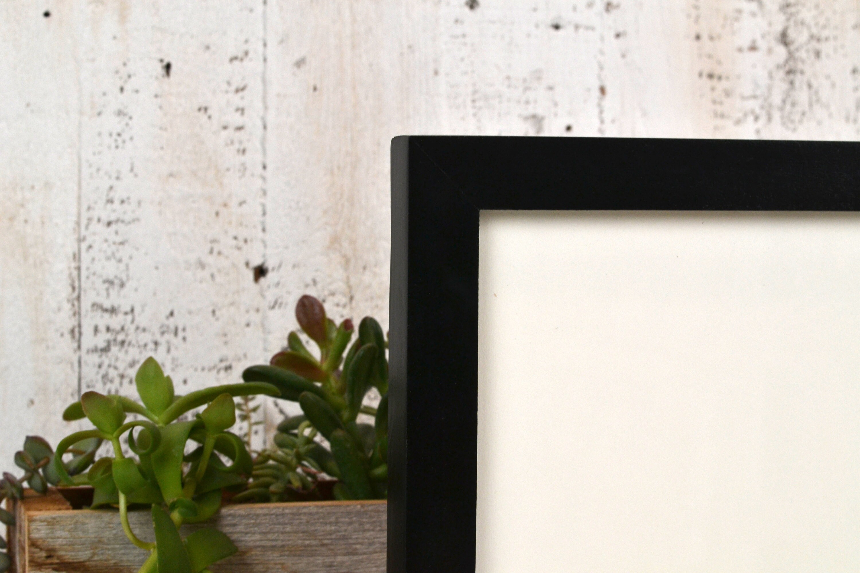 8.5 x 11 Picture Frame in 1x1 Flat Style with Solid Black Finish IN