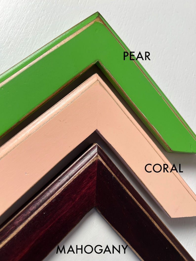 May include: Three angled corner sections of picture frames in different colors. The top frame is bright green labeled PEAR, the middle frame is light coral labeled CORAL, and the bottom frame is dark reddish-brown wood labeled MAHOGANY.