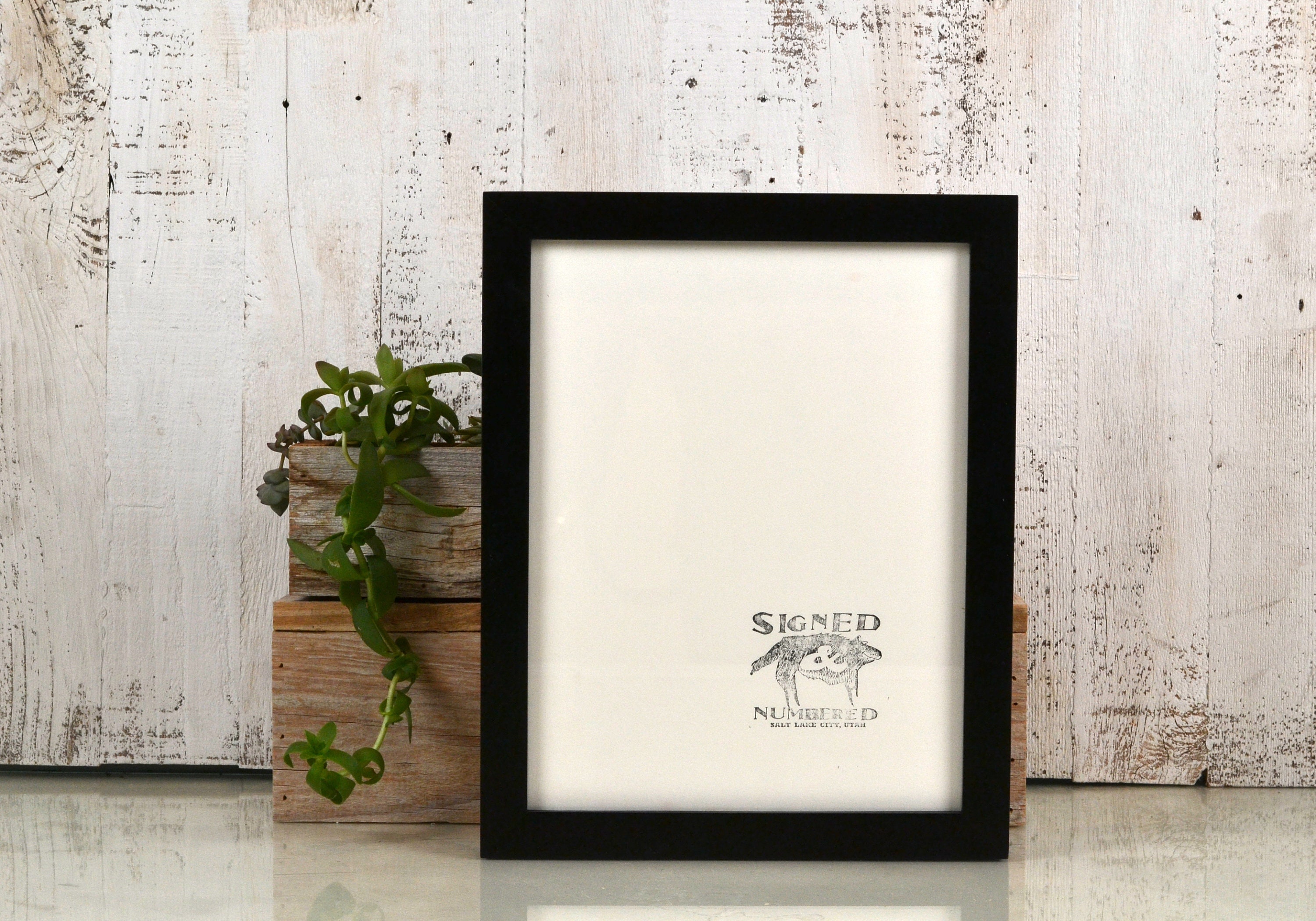 8.5 x 11 Picture Frame in 1x1 Flat Style with Solid Black Finish IN
