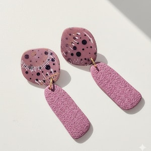 Dangling earrings in eggplant purple, hand-painted with acrylics, lightweight polymer clay design.