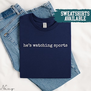 He&#39;s Watching Sports Shirt Sports Fan Shirt Funny Gift For Him Gift For Boyfriend Husband Gift Sports Lover Shirt Gift For Dad Sports T