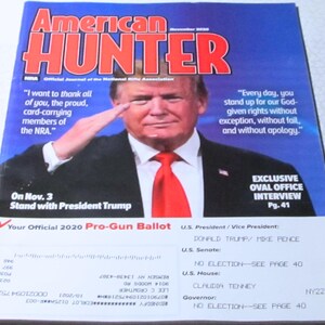 May include: The cover of the November 2020 issue of American Hunter magazine features a portrait of Donald Trump saluting. The magazine's title is in large red letters. The cover includes text about the NRA and an exclusive Oval Office interview.
