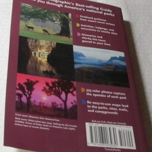 May include: A National Geographic guide to America's national parks. The cover features images of deer, landscapes, and trees. The back cover includes text about the guide's features, including colour photos and maps.