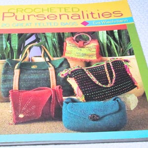 May include: A book cover titled "Crocheted Pursenalties" featuring images of various felted bags in different colors and styles. The bags include a green tote, a red clutch, a black crossbody, and a blue purse.