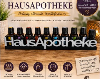 May include: A black display stand with the white text HausApotheke holding ten small amber glass essential oil bottles with black caps. The image includes German text such as HausApotheke, Ordnung, Übersicht, Wohlbefinden, and various icons representing organization, home, oil bottles, stability, and gifts.