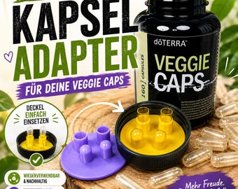 Könnte beinhalten: Ein Kapseladapter aus schwarzem und gelbem Kunststoff für dōTERRA Veggie Caps. Das Gerät besteht aus einer runden Basis mit vier aufrechten Stiften zum Halten leerer Kapseln, abgebildet neben einer Dose mit 160 Veggie Caps und losen Kapseln.