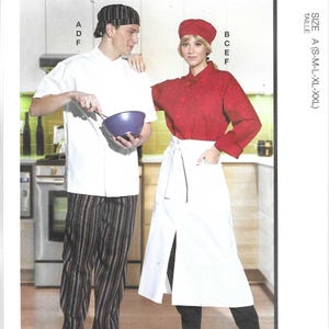 May include: McCall's M8332 sewing pattern envelope featuring a white chef coat, a red chef coat, striped pants, a white apron, and two chef hats. The text includes McCall's, M8332, SIZE A (S-M-L-XL-XXL), A D F, B C E F, and Designed and printed in USA.