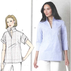 May include: Butterick sewing pattern B7080 for a tunic with a stand-up collar and V-neckline. The envelope displays a sketch of a short-sleeve striped version and a photograph of a solid light blue three-quarter sleeve version in sizes 12-22.