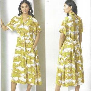 May include: A woman wearing a yellow and white patterned dress with short sleeves and pockets. The dress is from Vogue Patterns, size H5 (6-8-10-12-14). The dress is designed by Rachel Comey and printed in the USA.