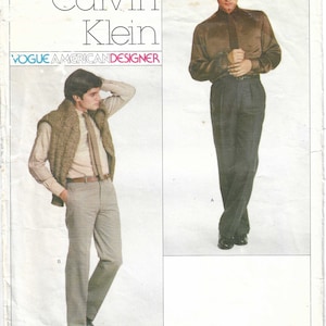 May include: A vintage sewing pattern for a men's shirt and pants by Calvin Klein, Vogue American Designer, pattern number 2256.