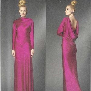 May include: Vogue Patterns sewing pattern featuring a long, magenta-colored evening gown. The dress has long sleeves and a draped cowl back. The pattern includes the text "V2129" and "TOM AND LINDA PLATT".