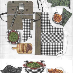 May include: Simplicity S3155 sewing pattern for kitchen accessories including a black and white gingham apron, oven mitts, and fabric bowl cozies. The pattern features various designs labeled A through F, showcasing finished items with green and black prints.