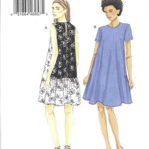 Very Easy Vogue Pattern V9237 Loose-Fitting Pullover Dress Has Back Ruffled Hem, Sleeve Variations & In Seam Pockets Misses&#39; Sizes 16 - 26
