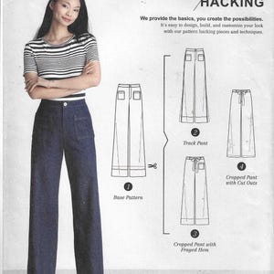 May include: Simplicity pattern 8701 H5 features a woman in a striped top and denim pants. The pattern includes options for a base pant, track pant, and cropped pants with cutouts or a frayed hem. The text reads "pattern hacking".
