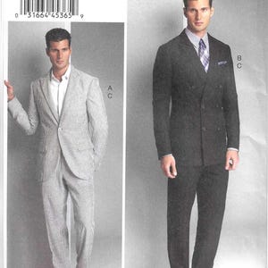 May include: Vogue Patterns V8988 sewing pattern envelope featuring two suit styles. Style A is a light gray pinstriped single-breasted blazer and trousers. Style B and C is a dark charcoal double-breasted blazer and trousers with a striped shirt.