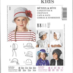 May include: A Burda Kids sewing pattern envelope for caps and hats, model 9496. The cover displays five styles of headwear, including bonnets, bucket hats, and beanies, with head circumference measurements ranging from 15 to 21.25 inches.