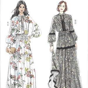 May include: Vogue Patterns sewing pattern featuring two long dresses. One dress is white with a floral print, the other is a dark floral print. The pattern includes sizes H5 (6-8-10-12-14). The Vogue Patterns logo is at the top.