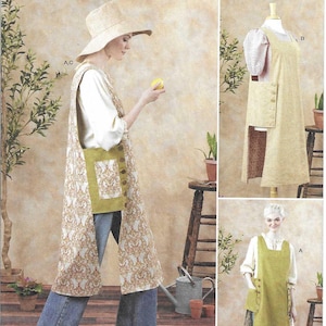 May include: Simplicity sewing pattern S3258 features a woman wearing a long apron with a floral design. The pattern includes sizes XS-XXL. The text "easy-to-sew" is visible.