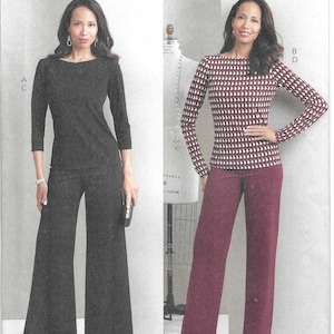 May include: Butterick sewing pattern B6966 featuring two women's outfits. One outfit is a black top and wide-leg pants. The other is a patterned top with wide-leg burgundy pants. The pattern includes sizes A5 (6-8-10-12-14).