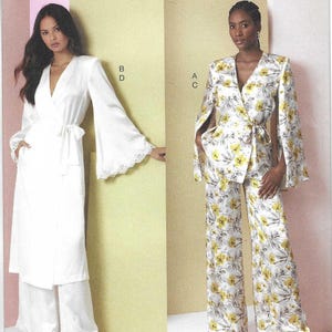 May include: Vogue Patterns V2020 sewing pattern. The image shows two women wearing different outfits. One is a white wrap-style outfit with wide-leg pants. The other is a floral print suit with a cape-like jacket and matching pants. The pattern is designed and printed in the USA.