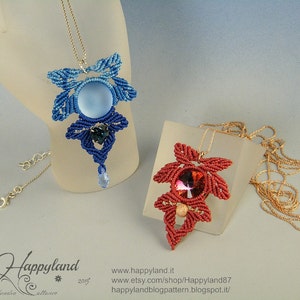 May include: Two handmade macrame necklaces with blue and red crystal pendants. The necklaces are displayed on a white surface with gold chains.