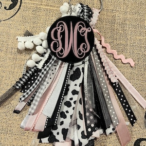Cow Print Bogg Bag Tassel