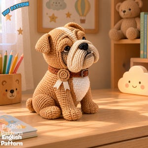 May include: A crochet bulldog toy featuring light brown yarn, a white chest patch, and a dark brown collar with a small rosette and white ribbon. The toy has a wrinkled face, black nose, and dark eyes, crafted with a detailed stitch pattern.