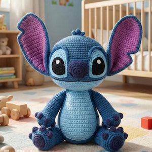 May include: A handmade blue crochet Stitch doll with large ears, black eyes, and a purple inner ear. The doll is sitting on a patterned rug with wooden toys and colorful blocks nearby. The words "PDF Pattern" and "English Pattern" are visible.