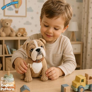 May include: A crochet bulldog toy featuring tan and white yarn, a black nose, and a brown collar with a small circular tag. The toy is crafted with detailed stitching and has a sturdy, seated posture. The text PDF PATTERN and English Pattern are visible.