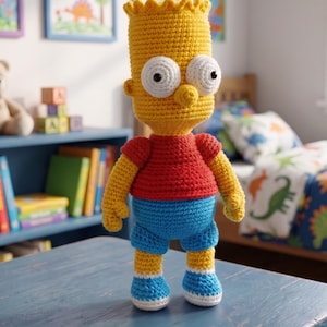 May include: A handmade crochet doll of Bart Simpson, featuring a yellow head with spiky hair, large white eyes, a red shirt, and blue shorts. The doll is standing on a blue table. The words "PDF PATTERN" are in the top left corner.