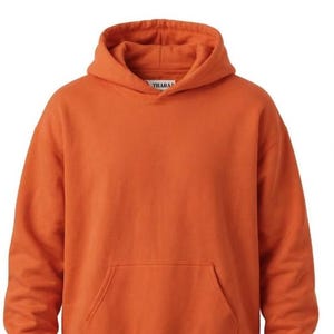 May include: A solid orange long-sleeve hooded sweatshirt featuring a front kangaroo pocket, ribbed cuffs, and a ribbed hem. The interior neck label displays the text THARA. The garment is constructed with a drawstring-free hood and a plain design.