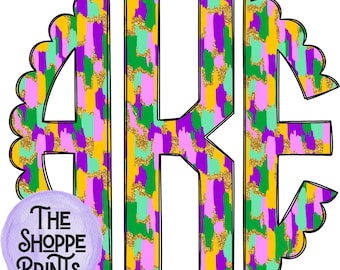 Puede incluir: Un diseño de monograma con las letras A, K y E en un círculo festoneado. Las letras están rellenas con un patrón colorido de morado, verde, amarillo y rosa con acentos de purpurina dorada.