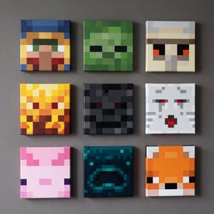 May include: A set of nine square canvas wall art pieces featuring pixelated Minecraft character faces. The collection includes a villager, zombie, iron golem, blaze, wither skeleton, ghast, axolotl, warden, and fox, all displayed in a grid layout.