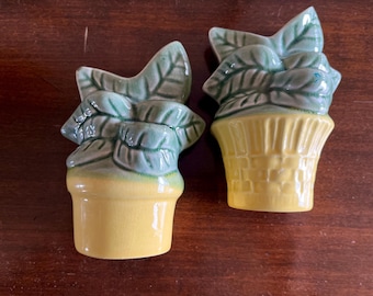 Two Shawnee Pottery Measuring Spoon Holders