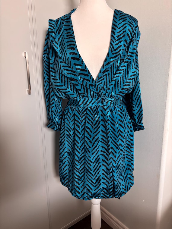 jonathan martin dress designer Can you help me find out the year this dress was released?